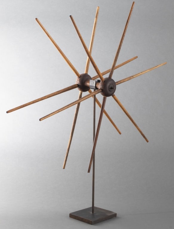 American Primitive Wood Yarn Winder, 19th C.: American Primitive Wooden Yarn Winder, 19th century, mounted on an ebonized metal stand. Overall: 26.75" H; 21" Diameter x 5.5" D. Provenance: From a New York City Collection. Keywords: Antiques