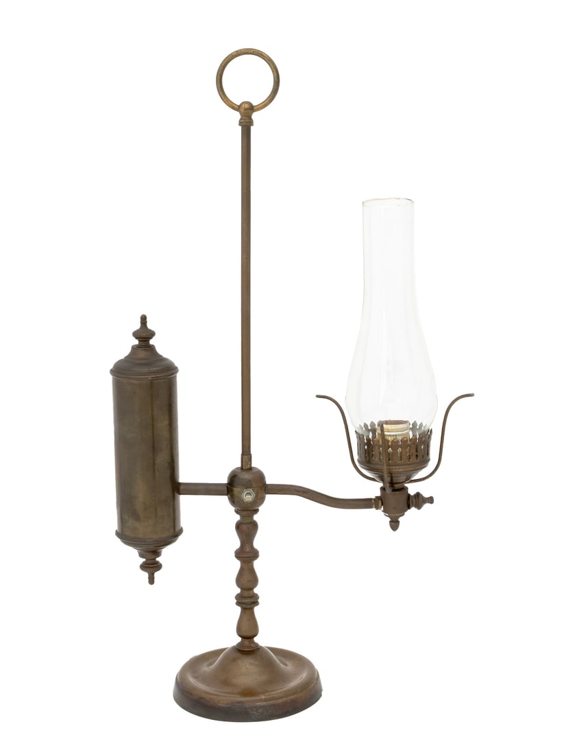 Manhattan Brass Co. Electrified Student Oil Lamp: Manhattan Brass Company Electrified Student Oil Lamp, with glass shade and ring handle on circular base. 25.5" H x 14" W x 6" D. Provenance: From a 21 East 87th Street Estate. Keywords: Lighting,