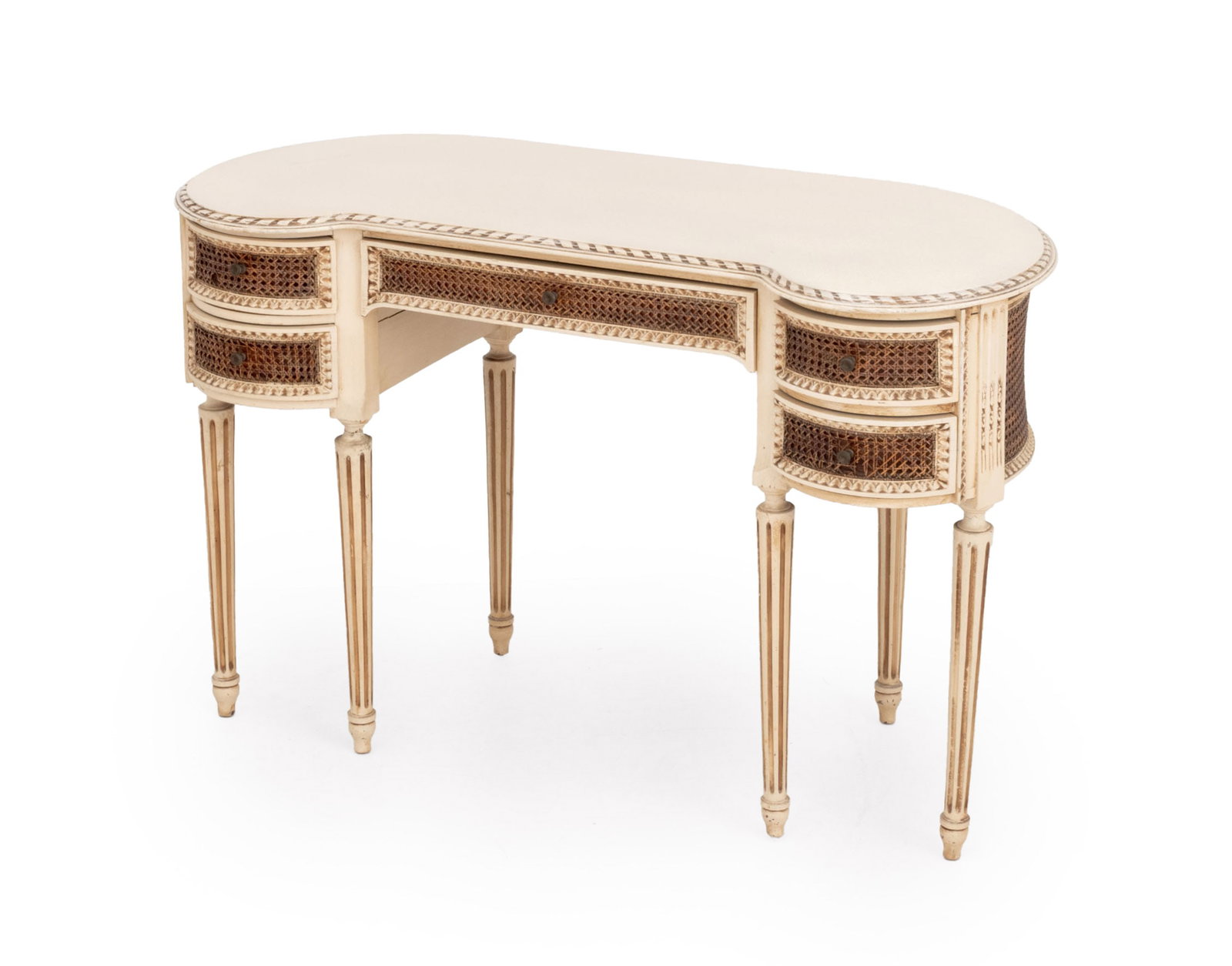 Louis XVI Style Cream Painted Kidney Shaped Desk: Louis XVI Style Cream Painted Kidney Shaped Desk, the central frieze drawer flanked with two side drawers with cane inlay, on fluted tapered legs. 29.75" H x 45" W x 20" D. Provenance: From a Connecti