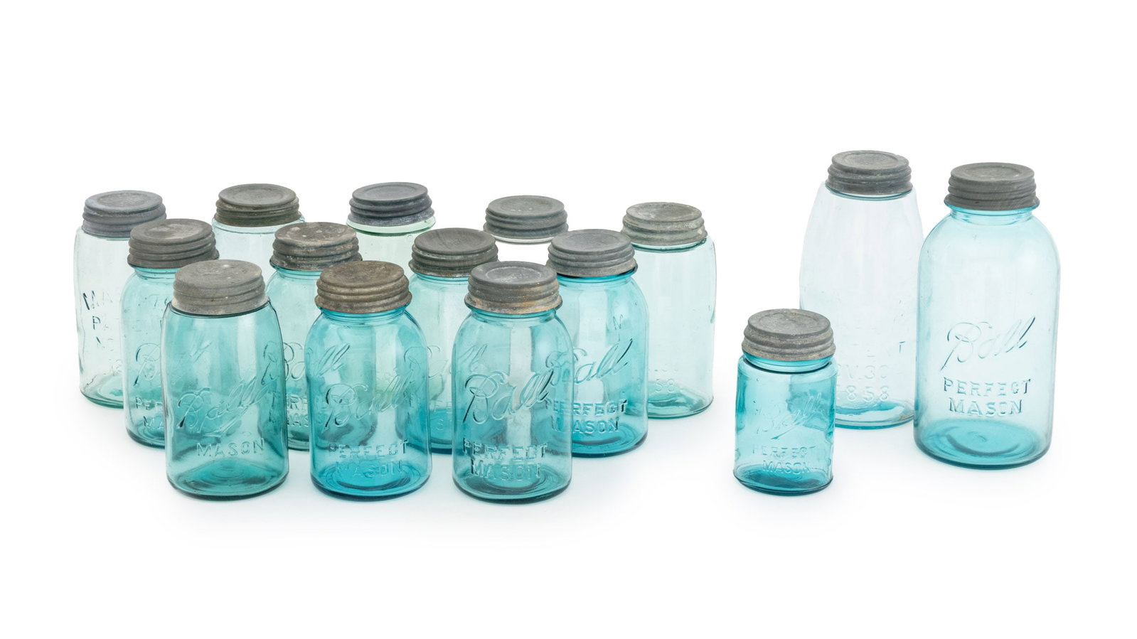 Collection of Ball Mason Jars, 15: Collection of Fifteen Vintage and Antique Ball Mason Jars, various dates ranging from 1885 to 1962, one colorless glass the rest aqua blue and marks "Ball Perfect Mason" and "Patent Nov. 20th 1858", a