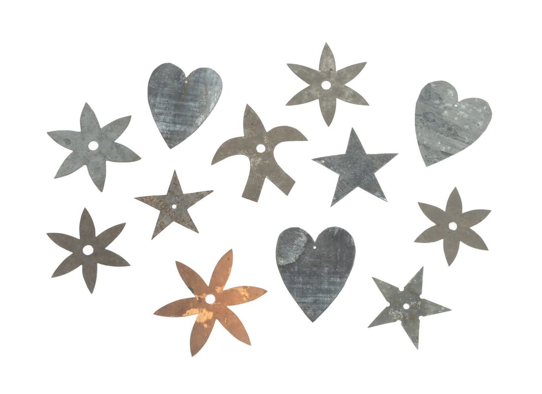 Collection of American Sheet Metal Appliques, 12: Collection of Twelve American Sheet Metal Appliques, comprising: three hearts, a fleur-de-lys form, three star forms, and five flower forms, one copper. Largest: 5.5" H x 5" W. Provenance: From a 21 E