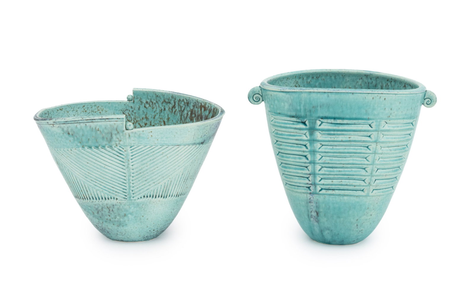 Art Deco Style Turquoise Glazed Porcelain Vases, 2: Two Art Deco Style Turquoise Matte Glazed Porcelain Vessels, each with geometric incised decoration to the body, illegibly signed to undersides. Taller: 7.5" H x 8.75" W x 5.25" D. Provenance: From a
