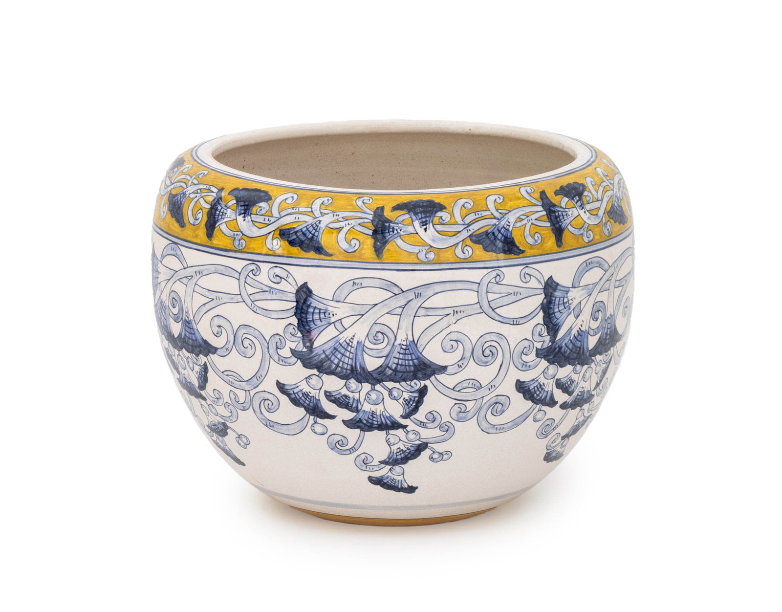 Deruta Italian Majolica Large Jardiniere: Deruta Italian Polychrome Glazed Ceramic Large Jardiniere, blue and white scrolling flowering vines with yellow top border, marked "Deruta / Dip A Mano" underside. 11.5" H x 15" Diameter. Provenance: