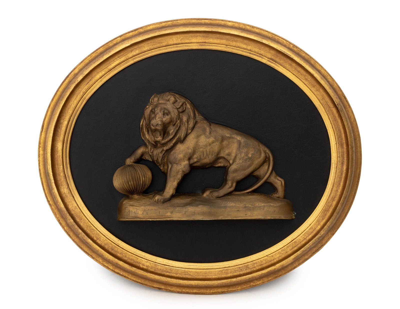 Grand Tour Style Gilded Lion Relief Plaque: Grand Tour Style Gilded Lion Relief Plaque, the gilt composite figure atop black leather within an oval gilt frame. Overall: 17.75" H x 20.5" W x 1.5" D. Provenance: From a New York City Collection.