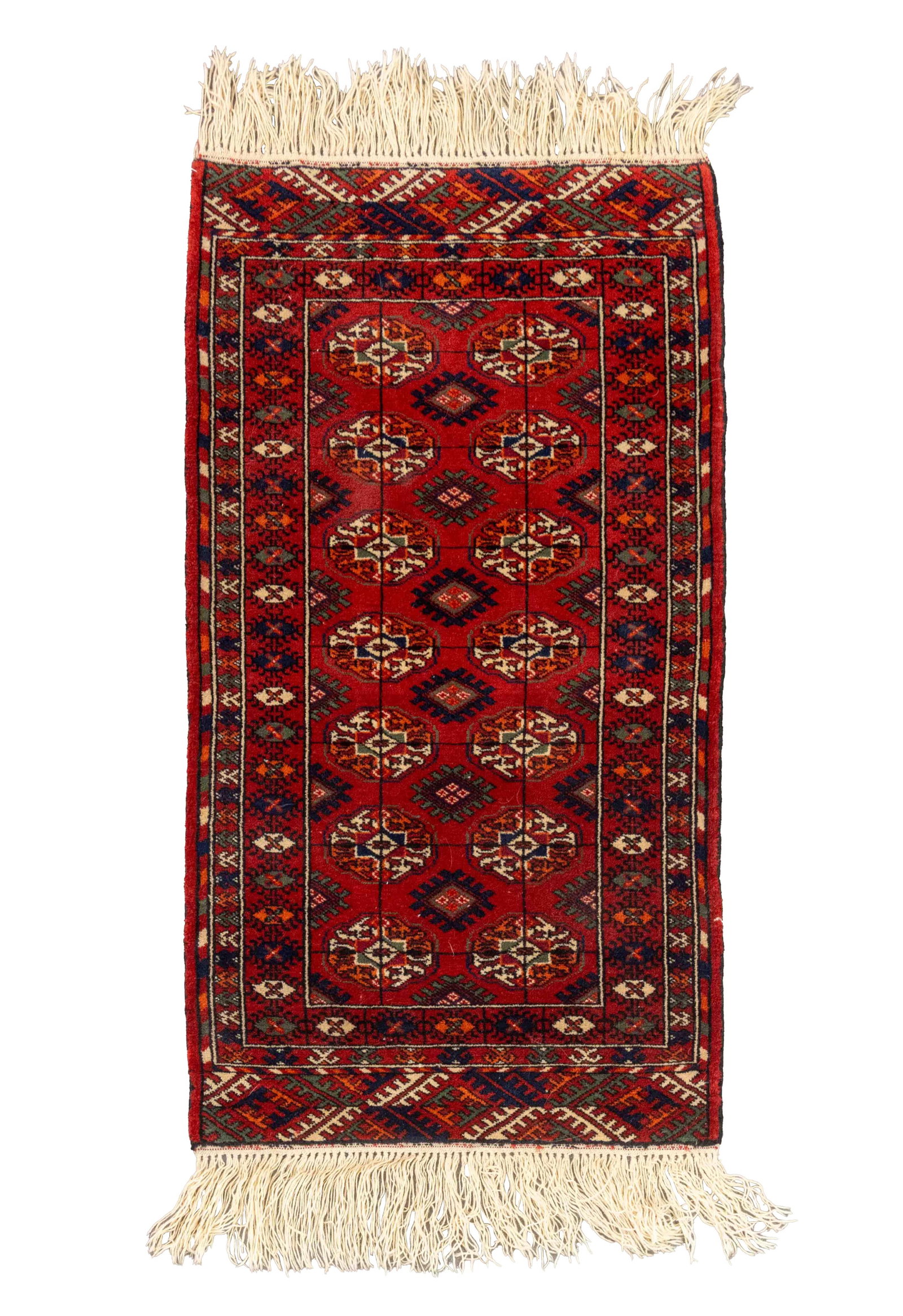 Persian Bokhara Rug, 5' 7" x 2': Persian Bokhara Rug, with repeating geometric pattern on a red ground. 5' 7" L x 2' 0.75" W Provenance: From a New York City Collection. Keywords: Oriental rugs, Area rugs, Carpets, Textiles, Floor co