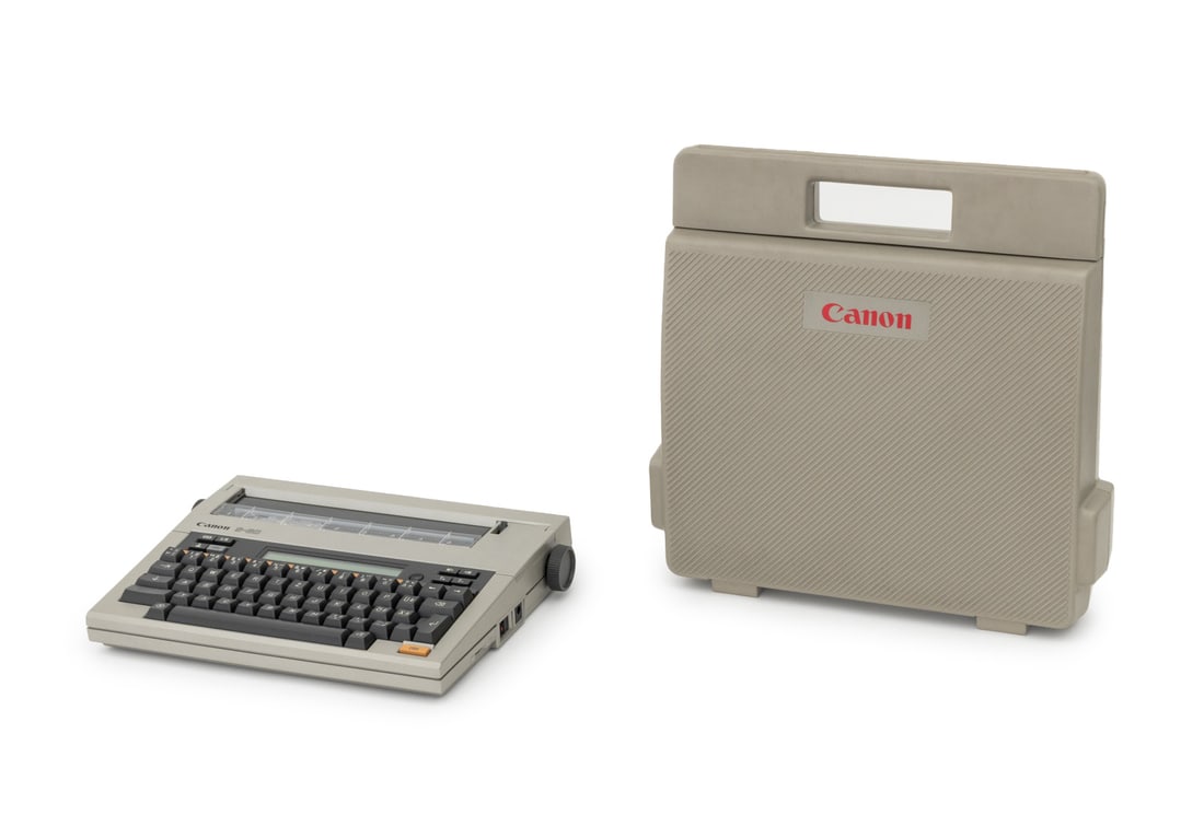 Canon S-60 German Language Electronic Typewriter: Canon S-60 German Language Electronic Typewriter, 1980s, Typestar 6, thermal typewriter, LCD screen, in original carry case, with one thermal transfer ribbon in case. Case: 14" H x 13.25" W x 3" D.