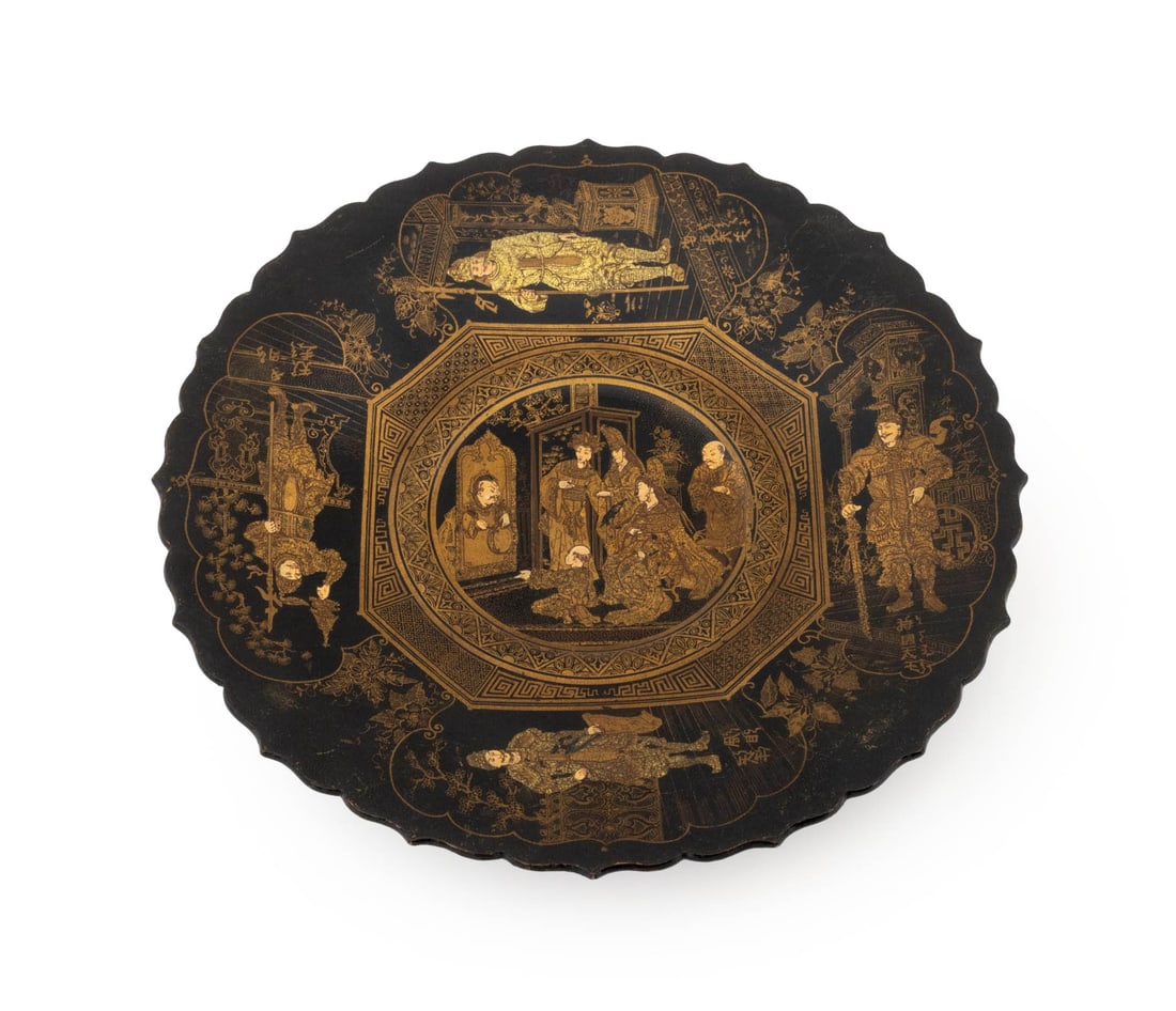 Victorian Chinoiserie Papier Mache Plate, 19th C.: Victorian Chinoiserie Style Papier Mache Plate, 19th century, black lacquered and decorated with figural vignette scenes in gilt, floriform rim and raised on a circular foot. 11.25" Diameter x 1.75"