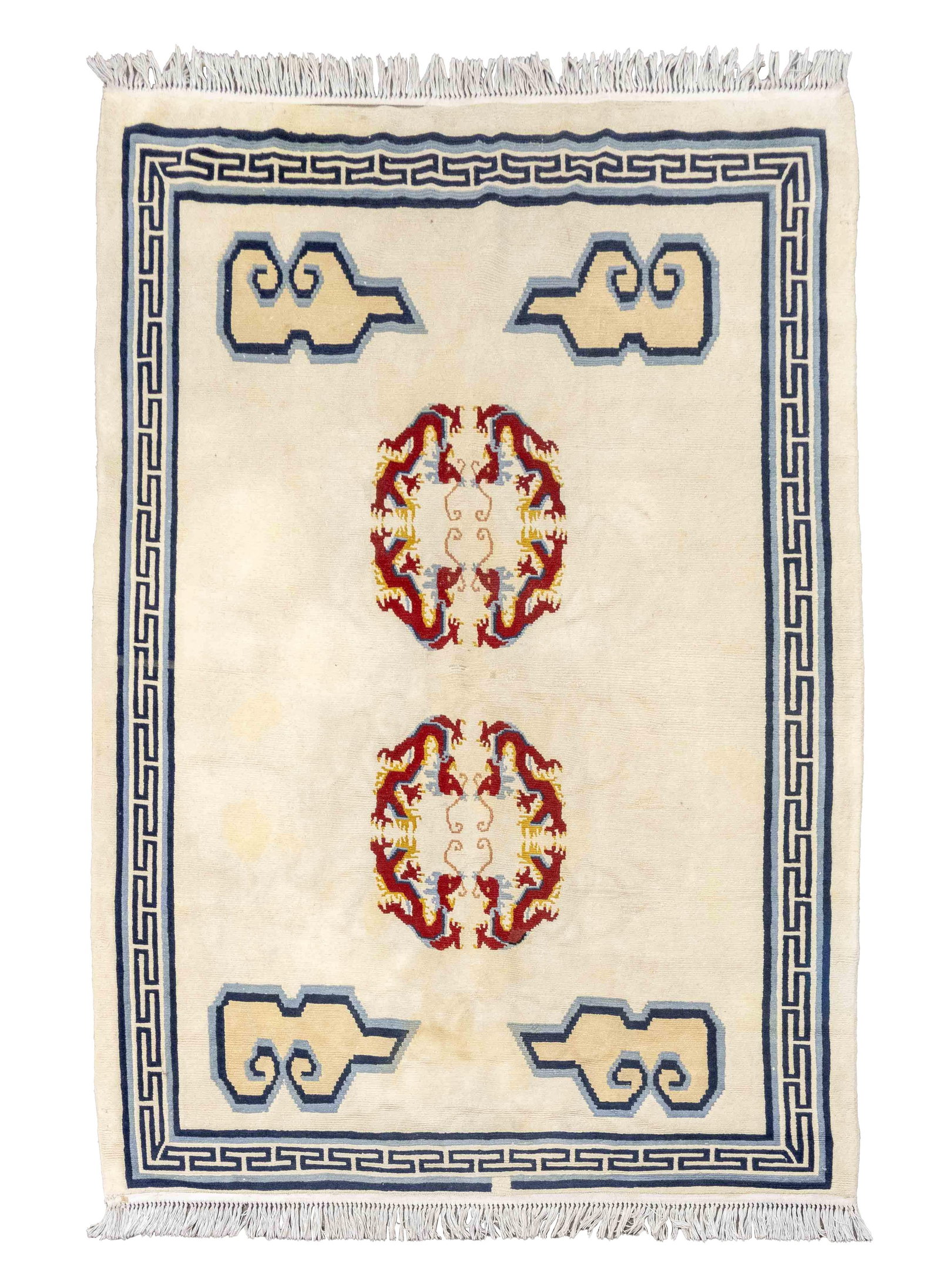 Tibetan Dragon Motif Carpet, 8' 11" x 6': Tibetan Dragon Motif Rug, decorated with two medallions of four red dragons amongst clouds within a blue Greek key border all on a cream ground. 8' 11" L x 6' 2" W. Provenance: The Estate of Alton G. 