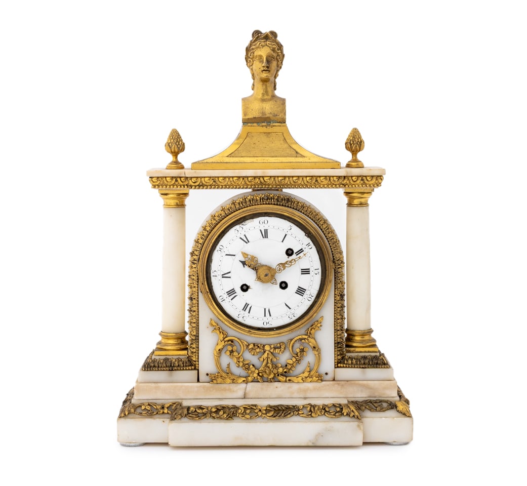Louis XVI Gilt Bronze and Marble Mantel Clock: Louis XVI Gilt Bronze and Marble Mantel Clock, late 18th century, of architectural form, the pediment surmounted by an Apollo portrait bust, supported by tapering columns, centered by the enamel dial,