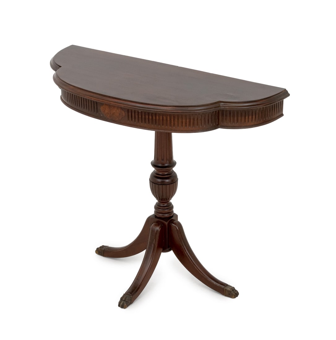 Neoclassical Style Mahogany Demilune Table: Neoclassical Style Mahogany Demilune Table, with three legs terminating in lion's paw feet. 32" H x 36" W x 15" D. Provenance: From a Connecticut Estate. Keywords: Vintage Furniture, Half Moon Table, 
