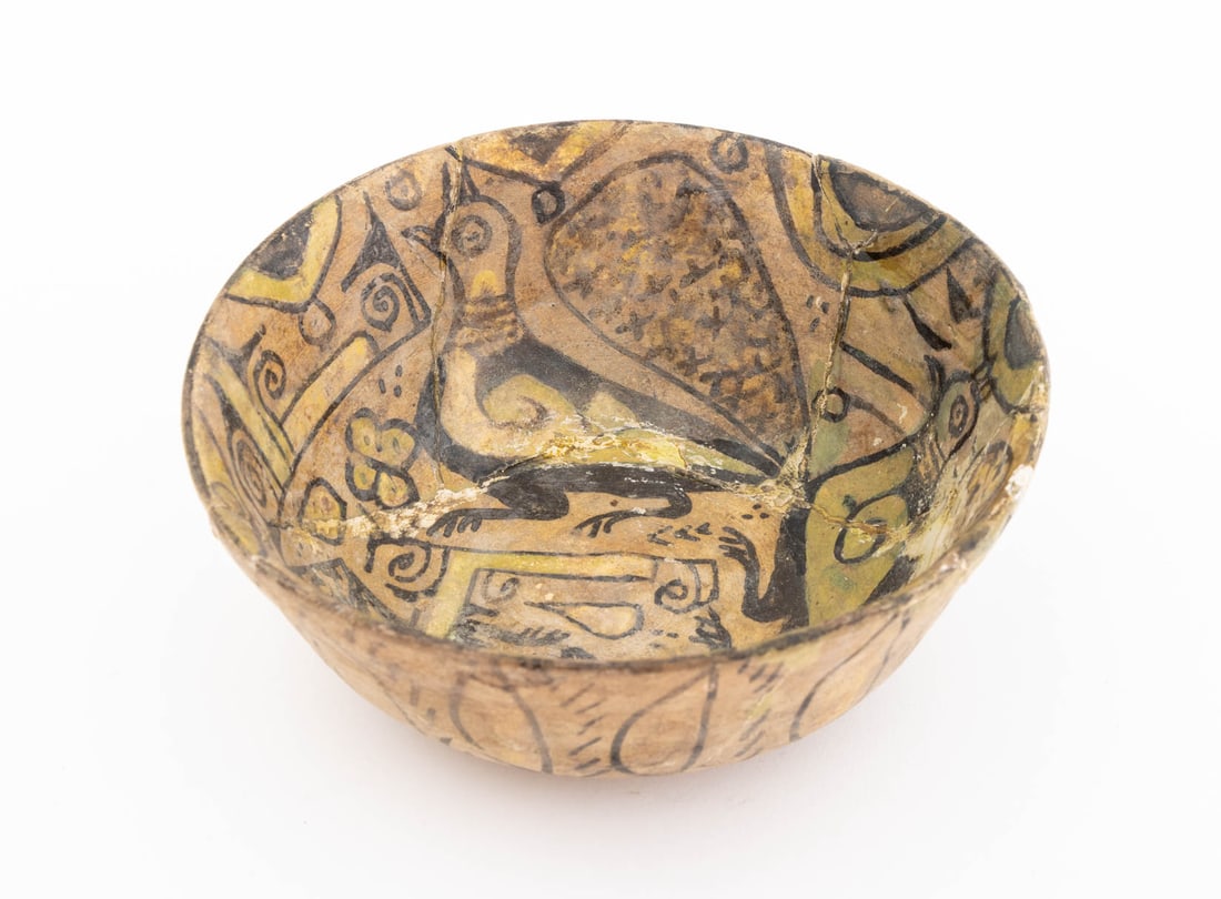 Persian Nishapur Glazed Pottery Bowl: Persian Nishapur Glazed Pottery Bowl, with bird and flower motif. 2.5" H x 6" Diameter. Provenance: From the Collection of Laura and Lewis Kruger. Keywords: Ceramics, Antique Pottery, Iran, Vessel, Co