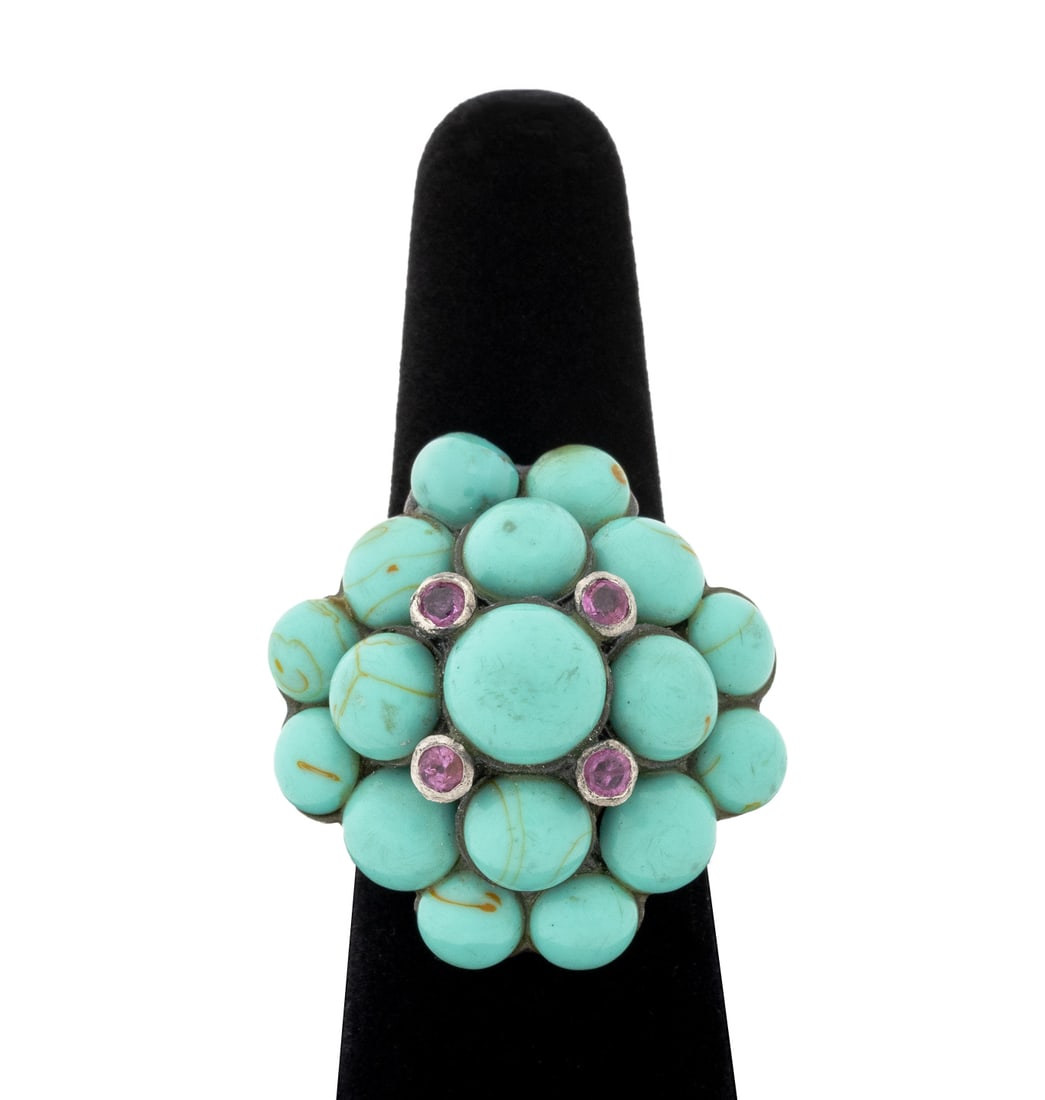 Sterling Silver Turquoise and Pink Sapphire Ring: Sterling Silver Turquoise and Pink Sapphire Ring, featuring seventeen bezel set round turquoise cabochons weighing a total of approx. 16.40 carats, further decorated with four bezel set round