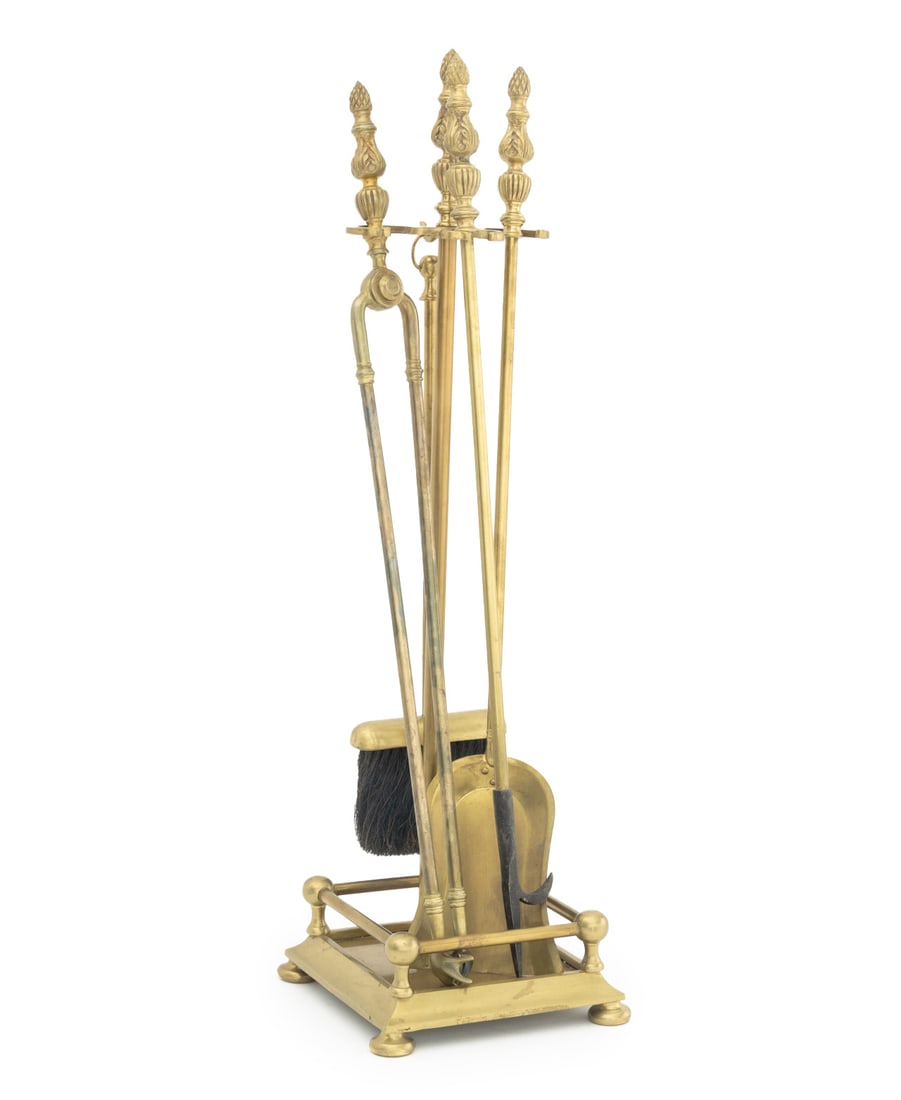 Neoclassical Style Fireplace Tool Set, 5 Pcs.: Neoclassical Style Brass Five-Piece Fireplace Tools Set, comprising: shovel, pair of tongs, broom, poker, and stand. Overall: 31" H x 9" W x 9" D. Provenance: From an Upper East Side Townhouse.