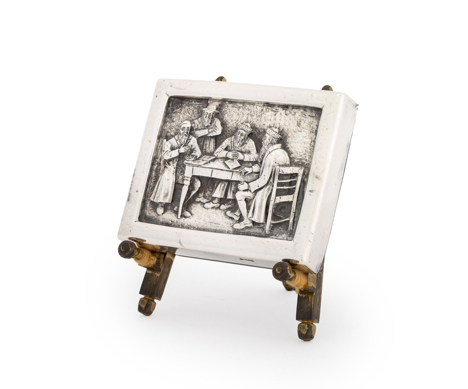 Henryk Winograd Fine Silver Figural Relief Plaque: Henryk Winograd (Polish/American, 1917-2008) .999 Silver Figural Relief Plaque, depicting Rabbis seated around a table, marked "HW999", with brass easel stand. Weight: 5.80 ozt.; overall: 3.25" H x 3"
