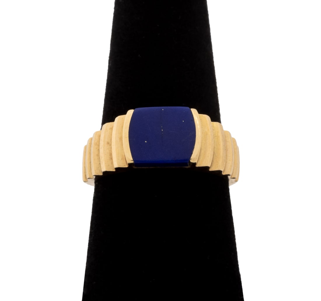 Mid-Century Modern Lapis Lazuli Yellow Gold Ring: Mid-Century Modern 14K Yellow Gold Lapis Lazuli Ring, brightly polished, adorned with one bezel set cushion lapis cabochon weighing approx. 1.35 carats, marked "14K" with maker's mark. Measuring appro