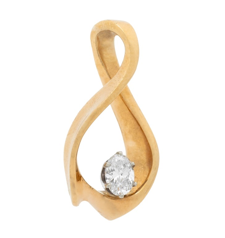Two-Tone Gold Oval Diamond Solitaire Pendant: 14K Yellow Gold and White Gold Oval Diamond Solitaire Pendant, adorned with one diamond weighing approx. 0.30 carat, prong set on an abstract figure eight motif, marked: "14K AJ" maker mark C inside c