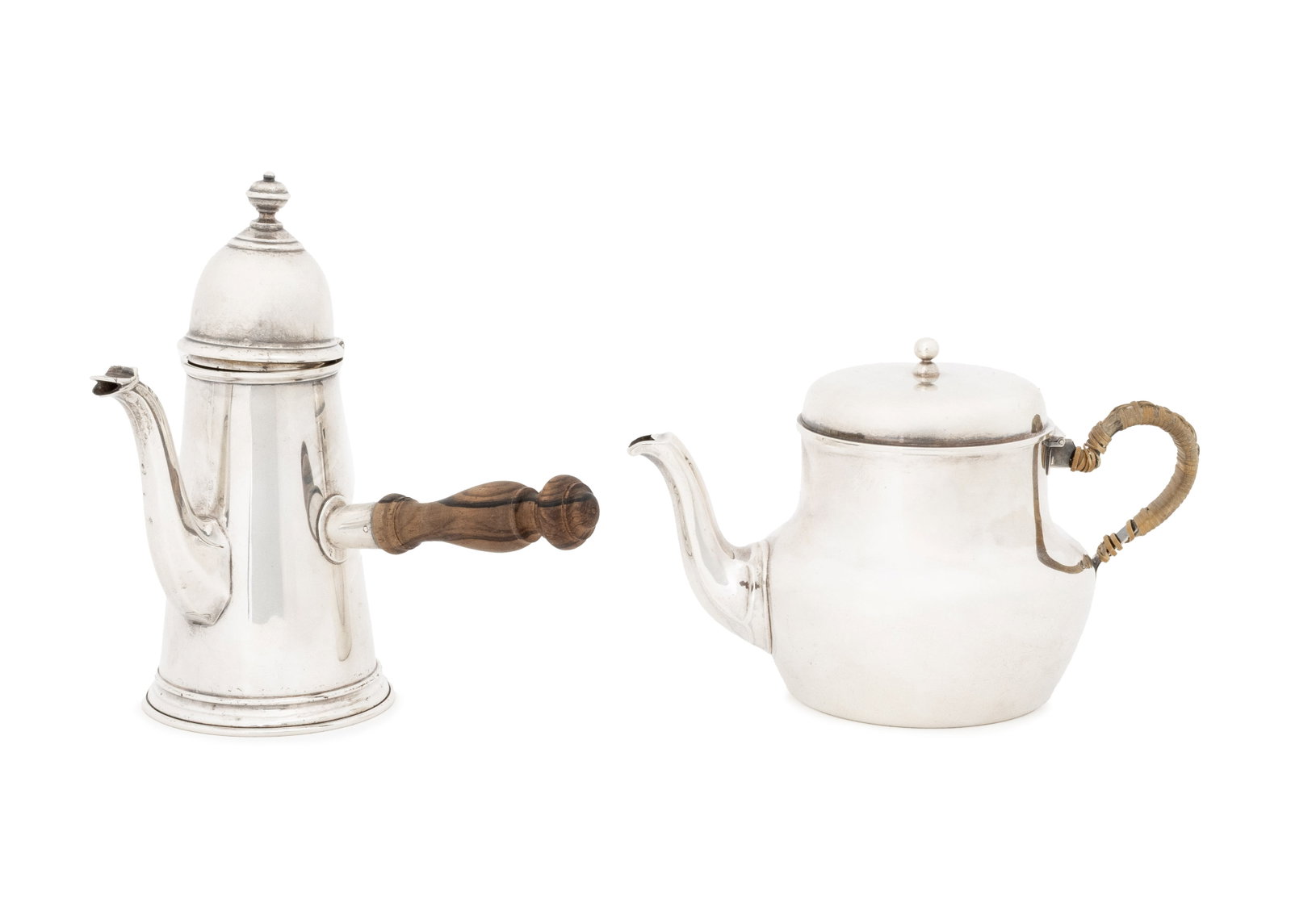 Tiffany & Co. Sterling Silver Tableware, 2 Pcs.: Two Tiffany and Company Sterling Silver Tableware Pieces, comprising: teapot with rattan wrapped handle and hot chocolate pot with carved wood handle, each marked "Tiffany & Co. / Sterling" to undersi