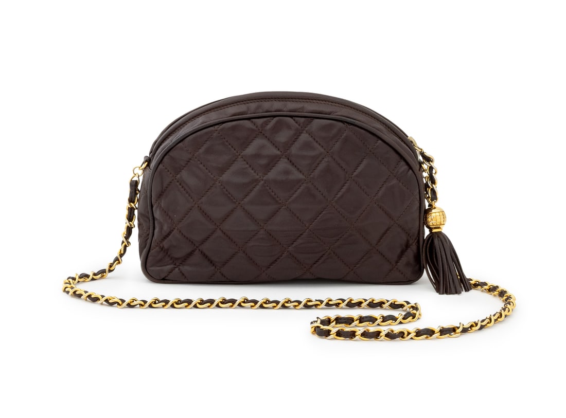 Chanel Chocolate Brown Quilted Leather Camera Bag: Chanel Chocolate Brown Quilted Leather Camera Bag, with leather and gold-tone chain and tassel, the top zipper opening to leather interior with single zipper, marked "Chanel / Made in Italy". 6.5" H x