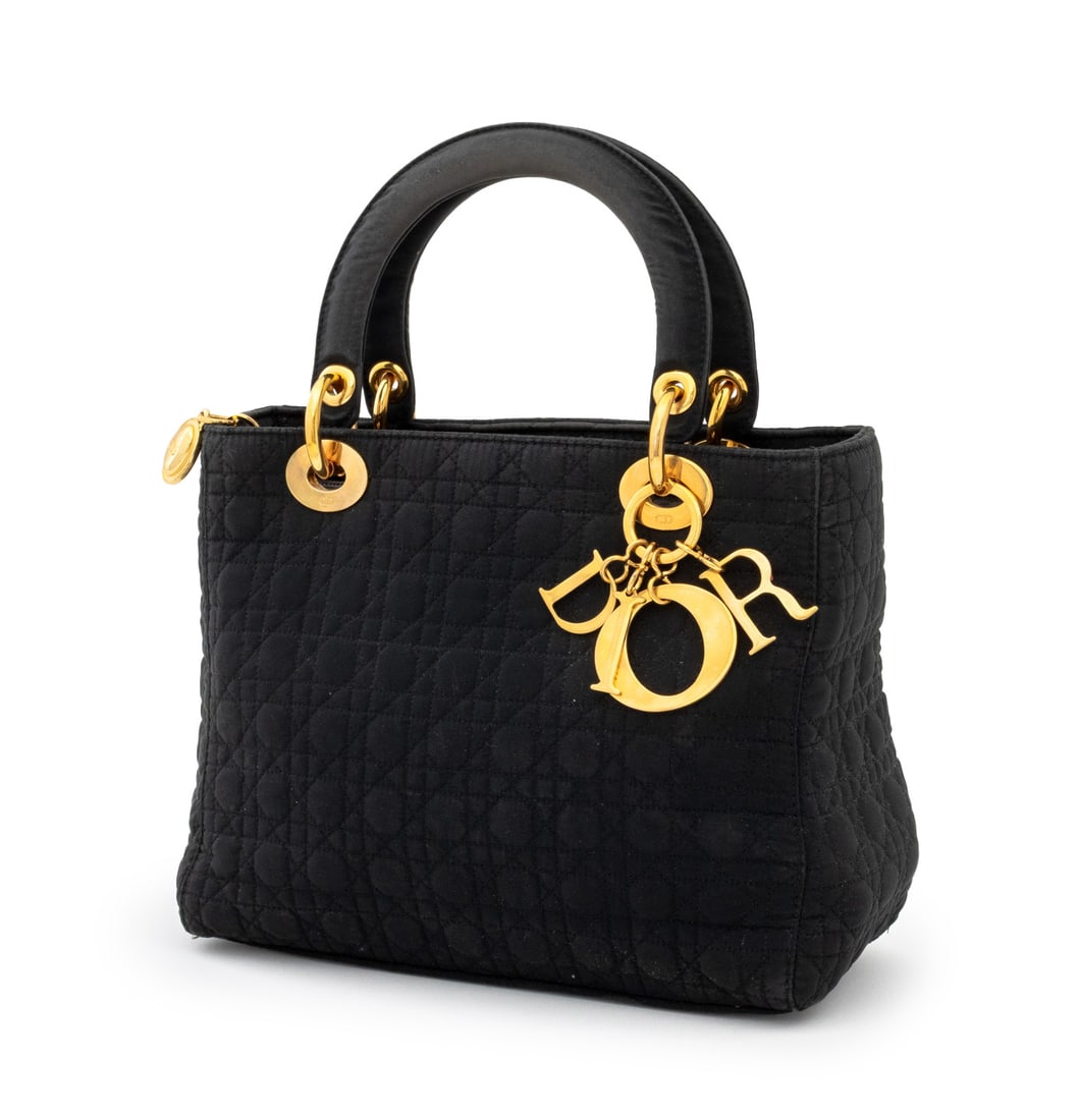Christian Dior "Lady Dior" Cannage Black Nylon Bag: Christian Dior "Lady Dior" Cannage Black Quilted Nylon Handbag, with gold-tone hardware and "Dior" charm, double top handles, the top zipper opening to red lined interior with single zipper pocket, ma
