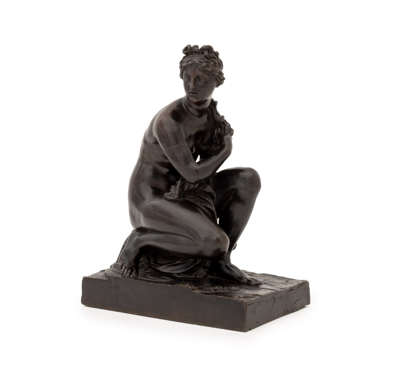 After the Antique Crouching Venus Bronze Sculpture: After the Antique Crouching Venus Patinated Bronze Sculpture, with turtle and drapery on rectangular base, unmarked. 14.5" H x 10" W x 6.5" D. Provenance: From a 500 Park Avenue Estate. Keywords: Stat