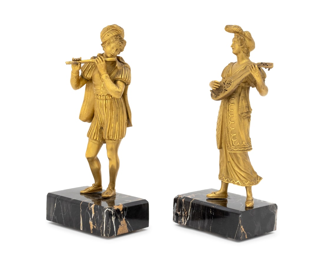 French Gilt Bronze Troubador Figure Sculptures, 2: Two French Gilt Bronze Troubador Figure Sculptures, mounted on nero portoro marble bases. 12" H x 6" W x 3.5" D. Provenance: From an Upper East Side Private Collection. Keywords: Antiques, Gilt decora