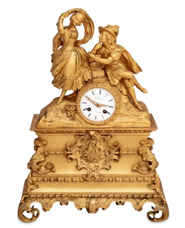 Charles X Gilt Bronze Figural Clock, ca. 1830: Charles X Gilt Bronze Figural Clock, circa 1830, the circular enamel dial signed "C. Chaste a Amsterdam", the movement strike on bell, surmounted by a courting couple, on a strapwork mounted graduated