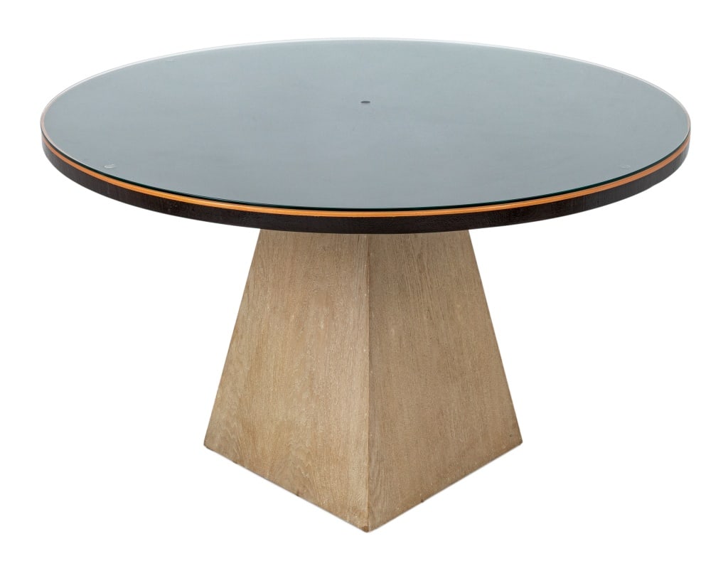 Modern Circular Glass Top Dining Table: Modern Circular Glass Top Dining Table, on a trapezoidal oak base. 31" H x 49.25" Diameter. Provenance: From a Palm Beach Collection. Keywords: Contemporary Furniture, Center table, Geometric, Dining 