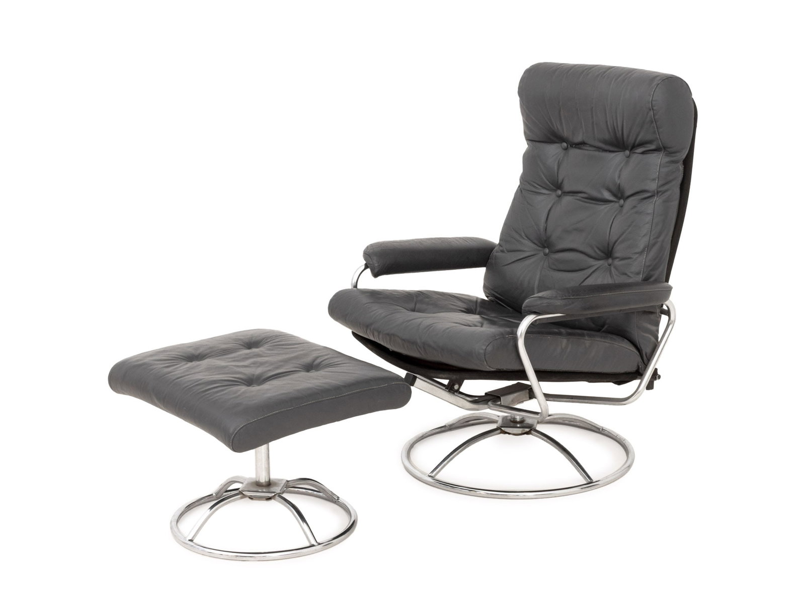 Ekornes Gray Leather Lounge Chair and Ottoman: Ekornes Gray Leather Upholstered Lounge Chair and Ottoman, with chrome-plated circular bases. 37" H x 30" W x 26" D; seat: 17" H. Provenance: From a 390 West End Avenue Estate. Keywords: Modern Furnit