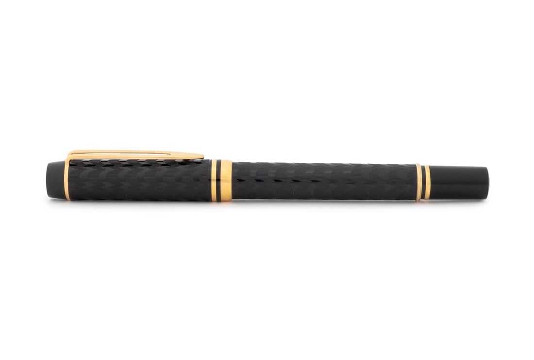 Waterman Le Man 100 Opera Fountain Pen: Waterman Le Man 100 Opera Fountain Pen, black patterned case with gold-plated accents, 18K gold nib marked "'Ideal' / Waterman / 18k-750 / Paris", marked "Waterman / Made in France" to cap. 5.75" L