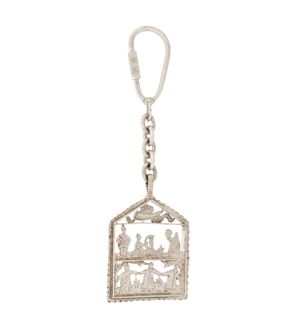 Judaica Figural Scene Pierced Silver Key Chain: Judaic Figural Scene Pierced Sterling Silver Charm Key Chain, designed as three levels of pierced charm images framed in house shape with pitched roof, decorated with scalloped edges, joined to chain 
