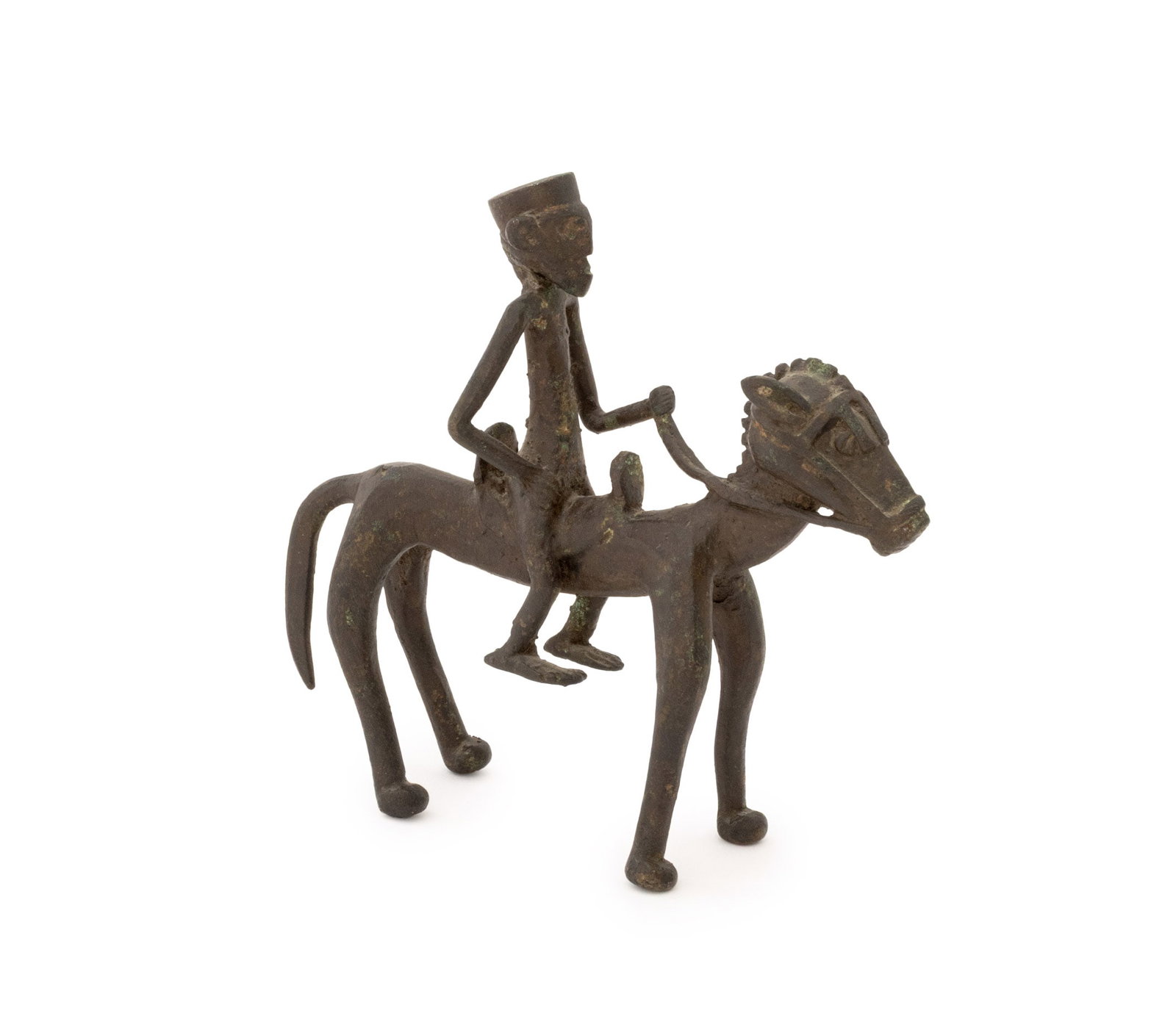 West African Equestrian Bronze Sculpture: West African Equestrian Patinated Bronze Sculpture. 5.5" H x 1.5" W x 5.75" D. Provenance: From the Fifth Avenue Estate of a Distinguished Author and Humanitarian. Keywords: African Art, Ethnographic