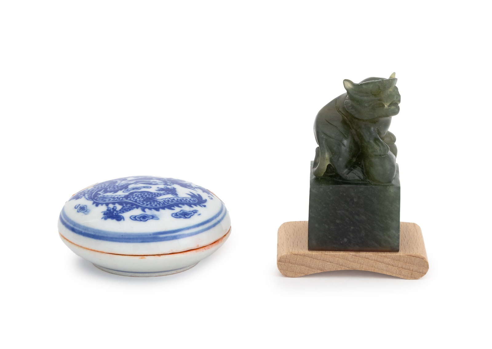 Chinese Carved Jade Chop Seal Set: Chinese Carved Jade Chop Seal Set, the chop seal carved with a foo lion, the blue and white porcelain ink box with dragon motif, with original box. Case: 2" H x 5" W x 3.75" D. Provenance: From the Fi