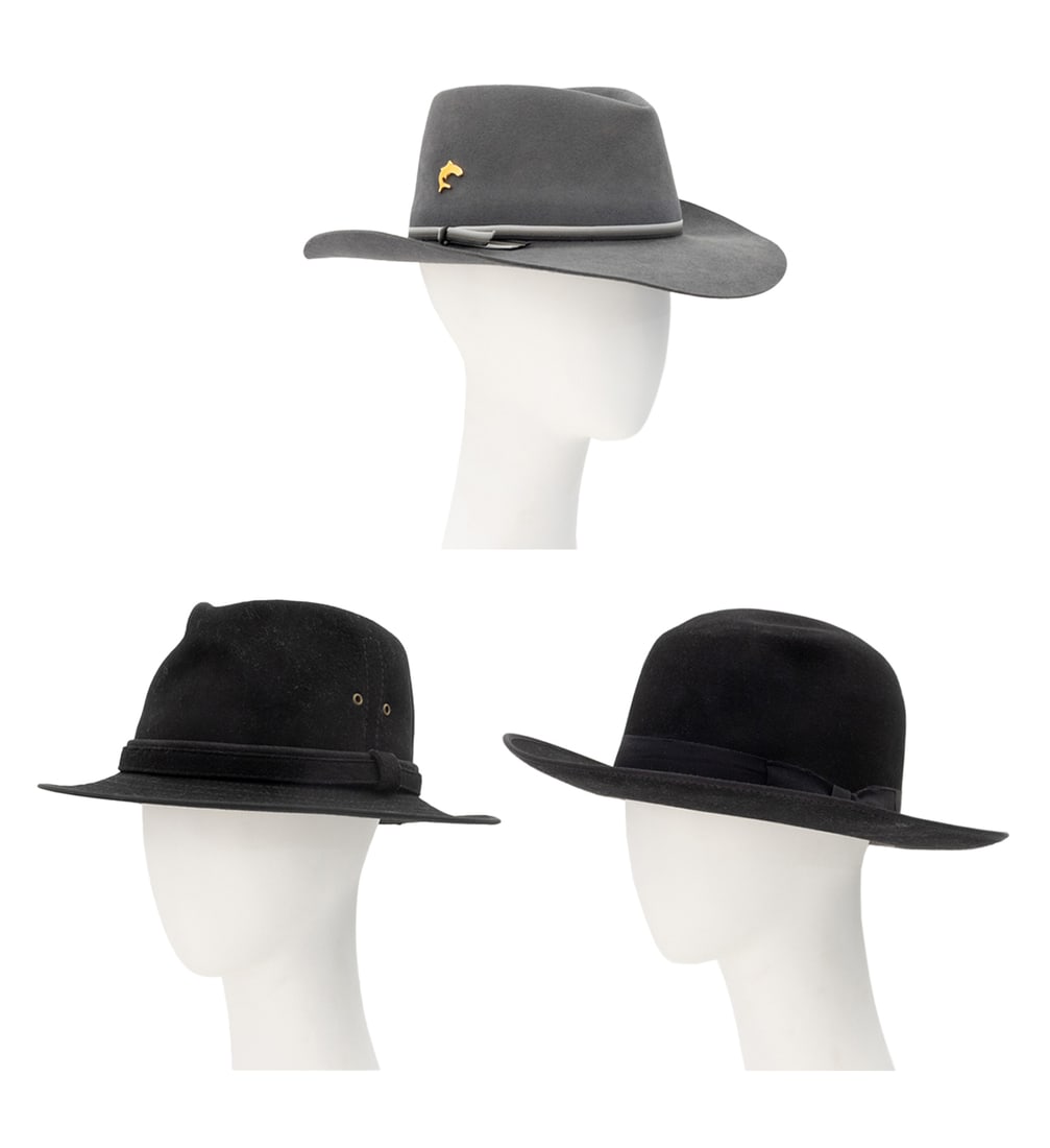 Collection of Gentleman's Hats, 3: Collection of Three Gentlemen's Hats, comprising: an Akubra "The Great White Shark" gray fedora from the "Greg Norman Collection", size 58, a Woolrich black wool hat, and an Akubra "Squatter