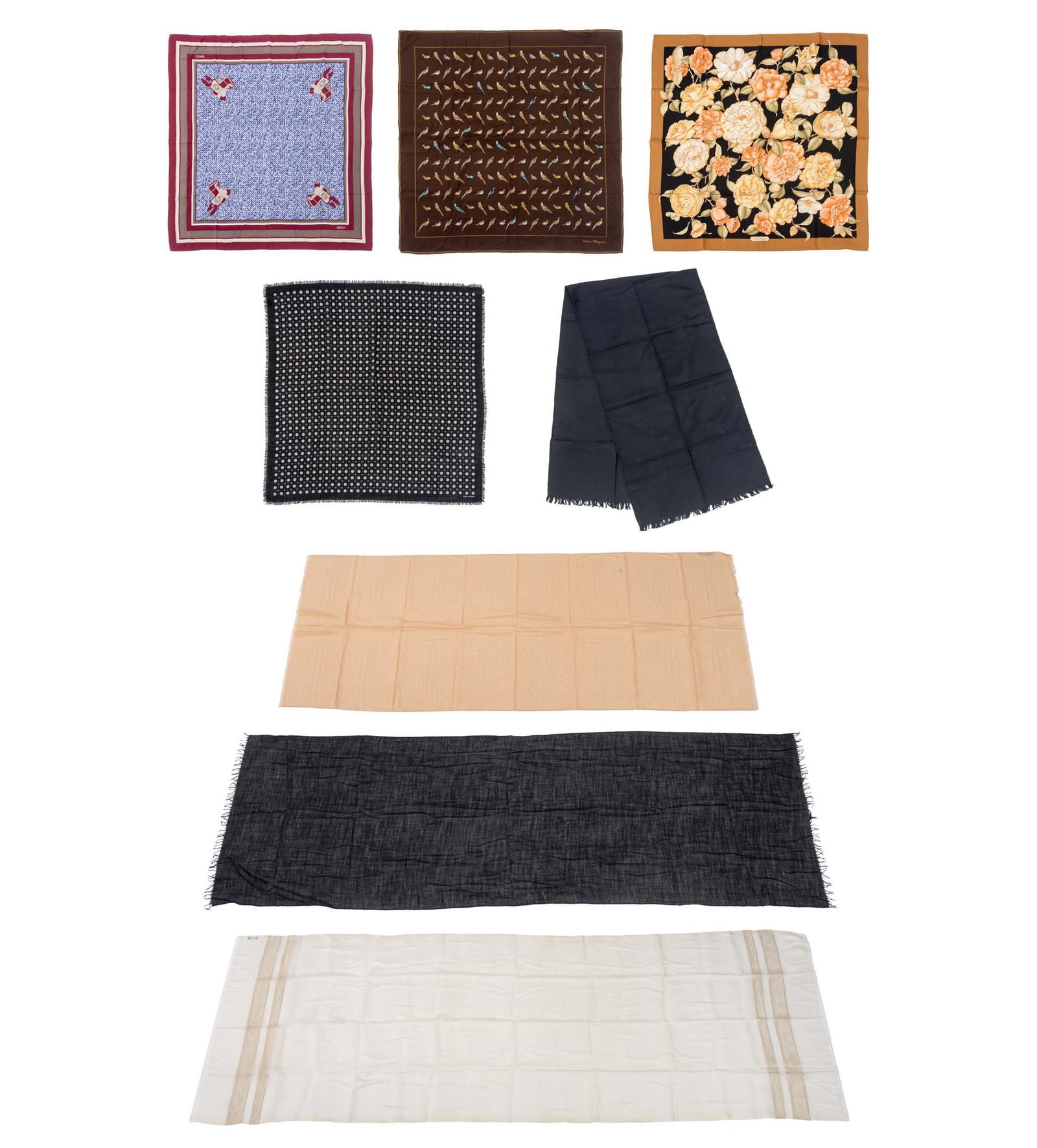 Salvatore Ferragamo, Etc. Designer Scarves, 8: Collection of Eight Designer Scarves, comprising: one Yves Saint Laurent Paris black square scarf, two Agnona silk and cashmere blend scarves, a Gucci silk scarf, and four Salvatore Ferragamo scarves,