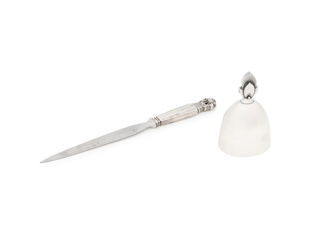 Georg Jensen Sterling Silver Table Articles, 2: Two Georg Jensen Sterling Silver Table Articles, comprising: acorn pattern sterling handled letter opener, marked and cactus pattern dinner bell, marked to base. Weight: 3.02 ozt. excluding steel blad