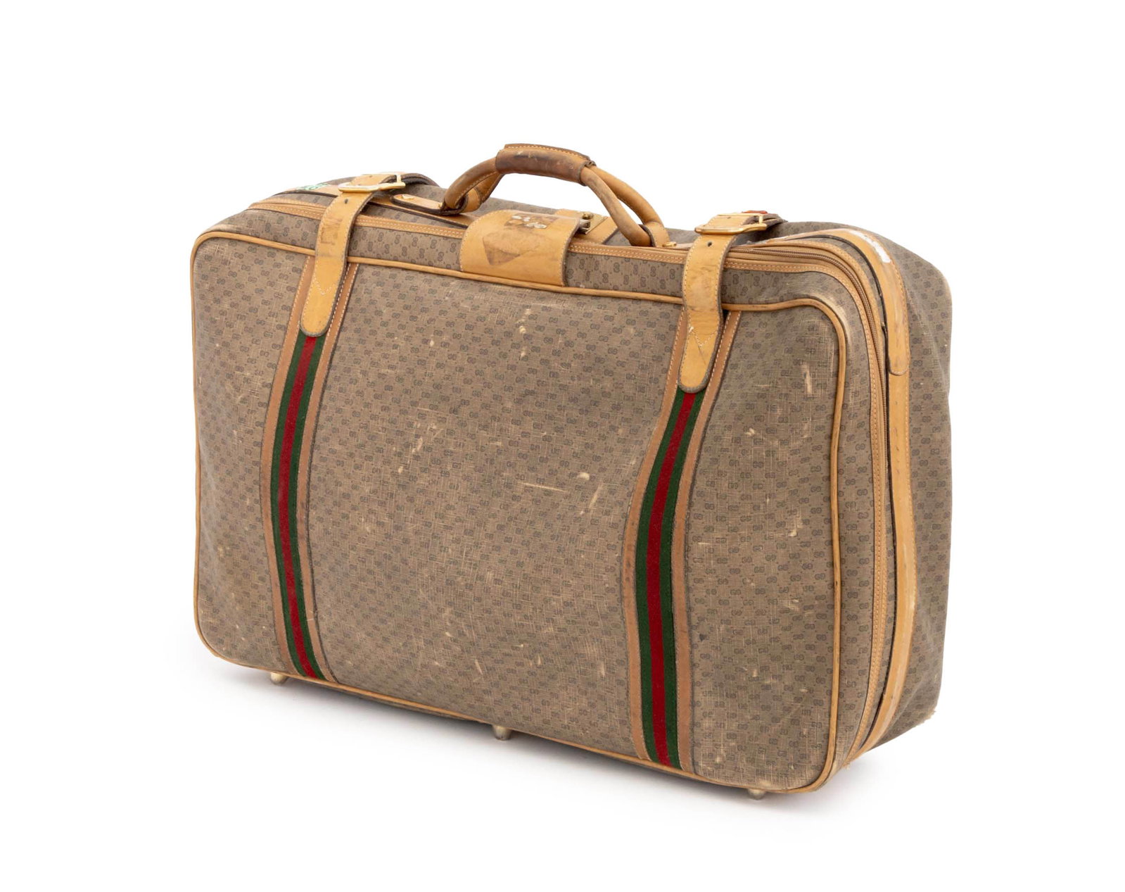 Gucci Monogram Soft Case Suitcase: Gucci Monogram Canvas and Leather Soft Case Suitcase, with green and red cotton stripes, tan leather top handle and double straps, with paper label remnants from travel, opening to champagne cotton
