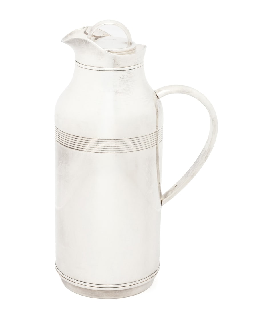 Christofle Silver Plate Thermos: Christofle Silver Plate Thermos, marked to lid. 11.25" H x 6.5" W x 4.5" D. Provenance: From the Fifth Avenue Estate of a Distinguished Author and Humanitarian. Keywords: Designer, French, Luxury good