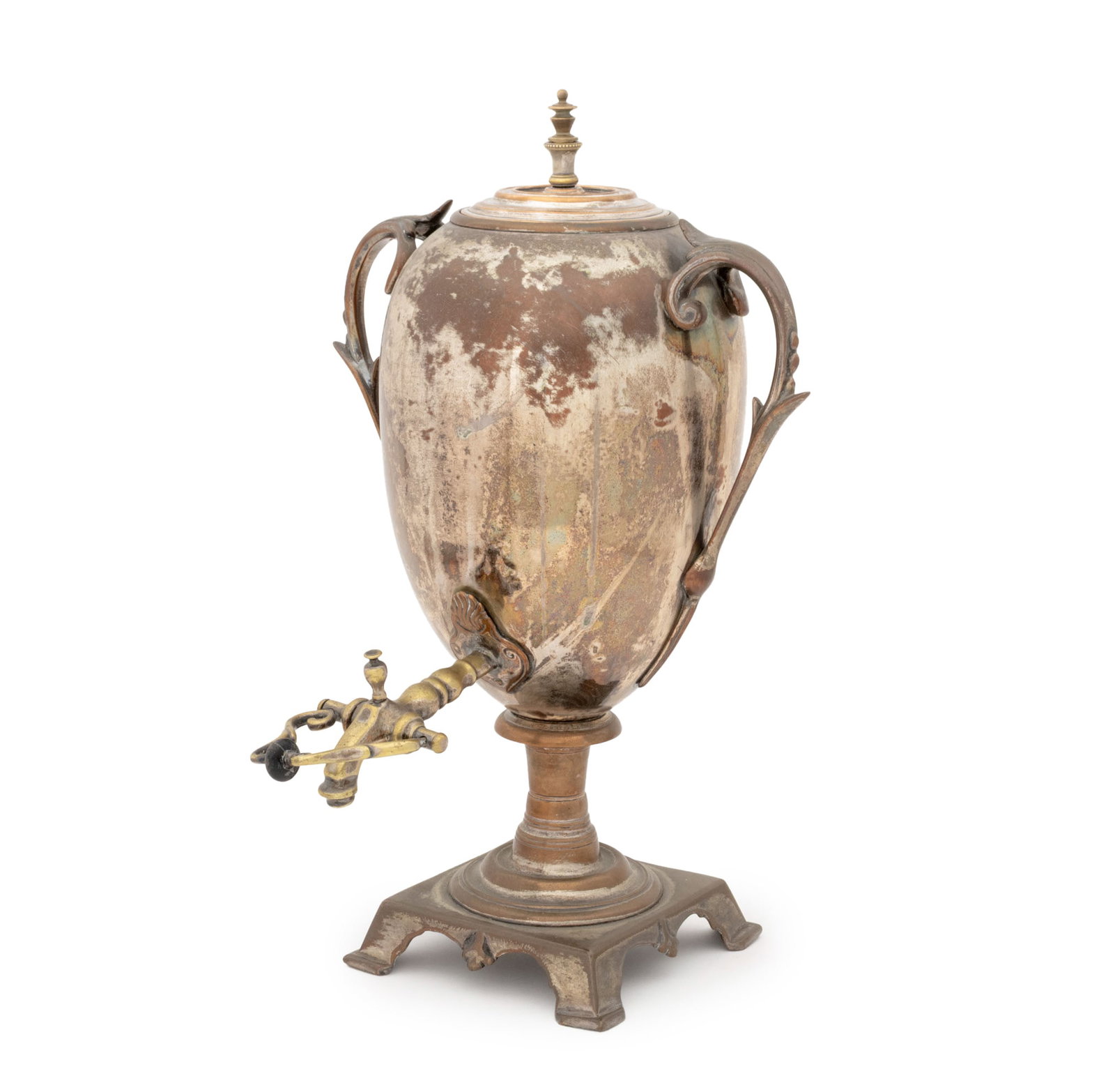 Victorian Silver Plate Coffee Urn: Victorian Silver Plate Coffee Urn, with two foliate handles and brass dispenser on square base. 18.25" H x 11" W x 12.5" D. Provenance: From the Fifth Avenue Estate of a Distinguished Author and Human