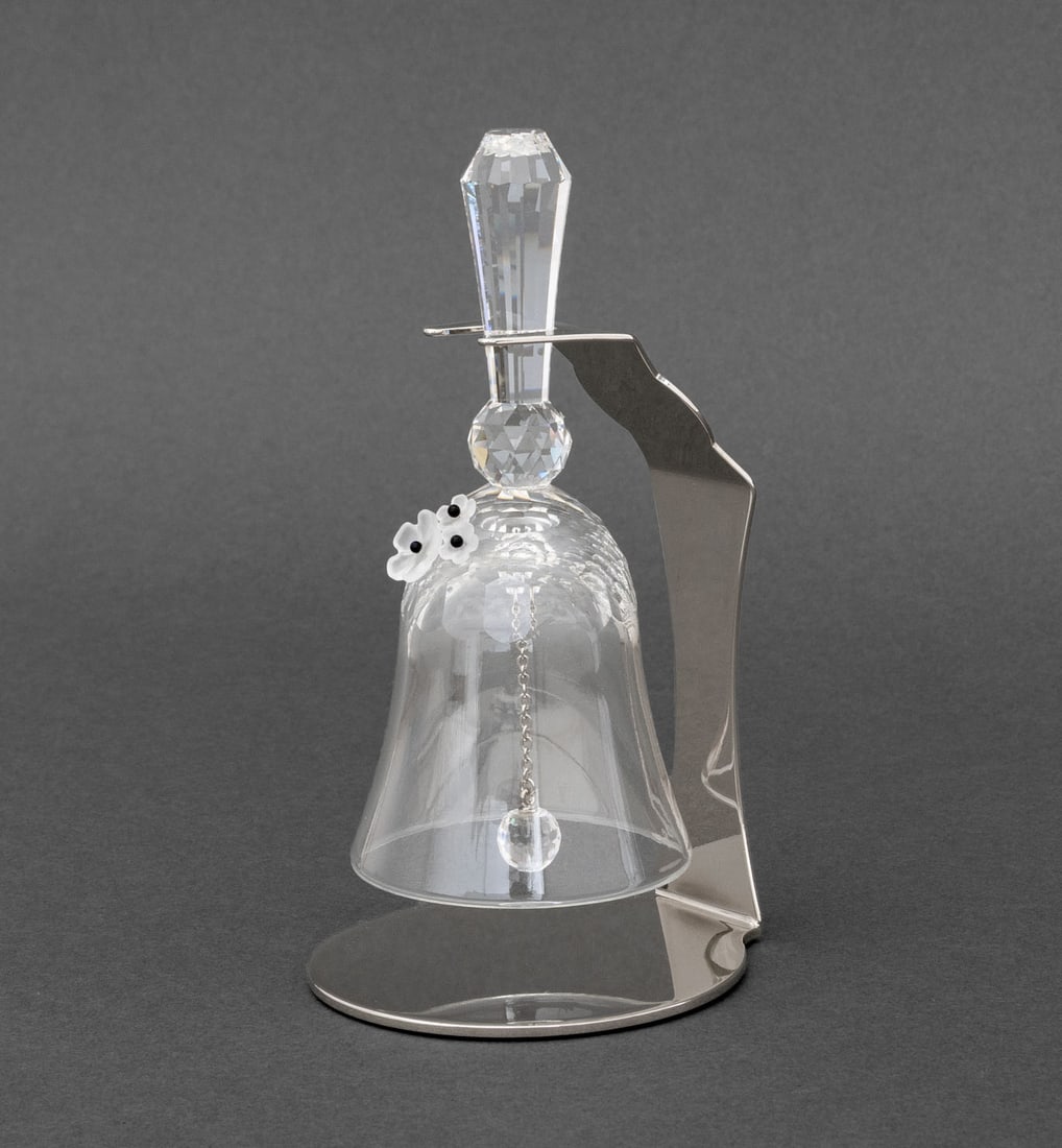 Swarovski Crystal Table Bell: Swarovski Crystal Table Bell, with flower accents and stainless steel stand, marked to the base and marked "World Economic Forum / Swarovski" to the stand, with white fitted box. Overall: 5.5" H x