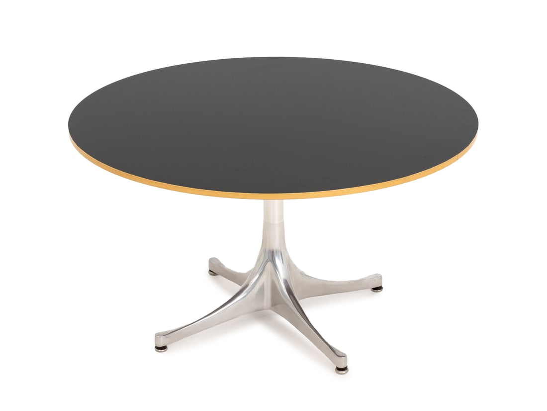 George Nelson for Herman Miller Pedestal Table: George Nelson for Herman Miller Pedestal Table, black veneered maple top above aluminum base, Herman Miller label to underside. 16" H x 28.5" Diameter. Provenance: An East 87th Street Collection. Keyw