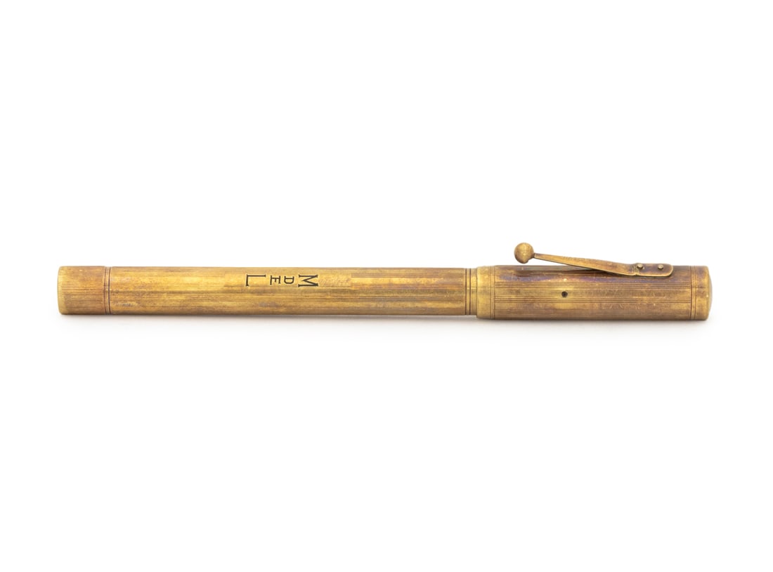 Waterman's Ideal Gold Plate Fountain Pen: Waterman's Ideal Gold Plate Fountain Pen, marked "Made in U.S.A." beneath cap, and marked "0552 1/8 / L.E.C." to end. 5.25" L. Provenance: The Estate of Alton G. Marshall, former aide to Nelson