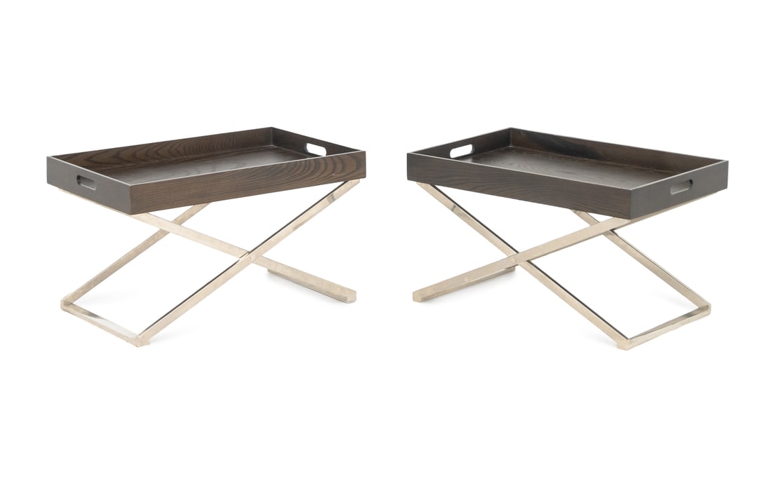 West Elm Mahogany Low Tray Tables, Pair: Pair of West Elm Mahogany Low Tray Tables, on chrome-plated folding X-form bases. 17" H x 28" W x 18" D. Provenance: From a SoHo, New York Collection. Keywords: Contemporary Furniture, Designer, Butle