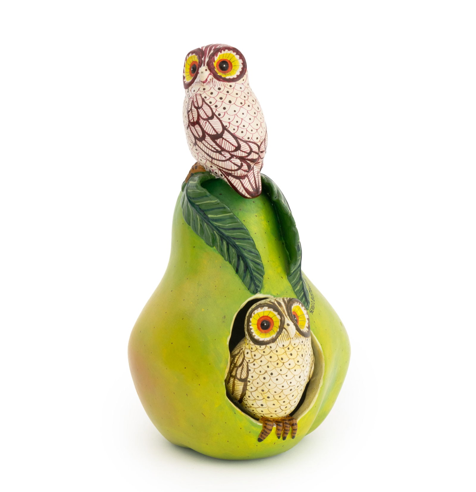 Sergio Bustamante Owls in a Pear Sculpture, 1984: Sergio Bustamante (Mexican, b. 1949) Pair of Owls in a Pear Sculpture, hand-painted ceramic, 1984, signed and dated to side. 9.5" H x 4.75" W x 5" D. Provenance: From an Upper East Side Estate. Keywor