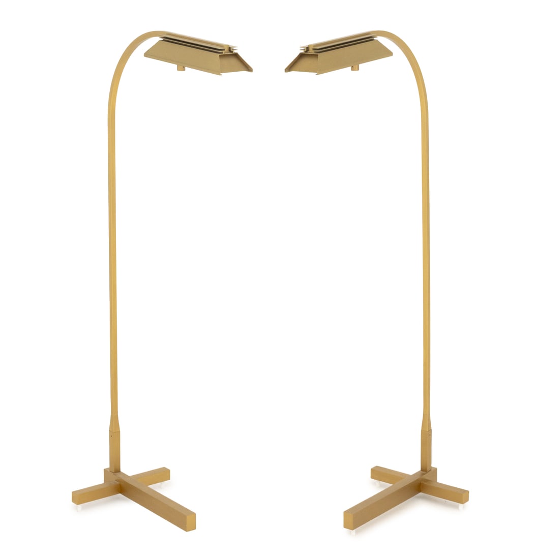Casella Lighting Adjustable Floor Lamps, Pair: Pair of Casella Lighting Brushed Brass Adjustable Floor Lamps, labels to undersides. 43" H x 18" W x 10" D. Provenance: From a 500 Park Avenue Estate. Keywords: Lighting, Designer, American lamps,