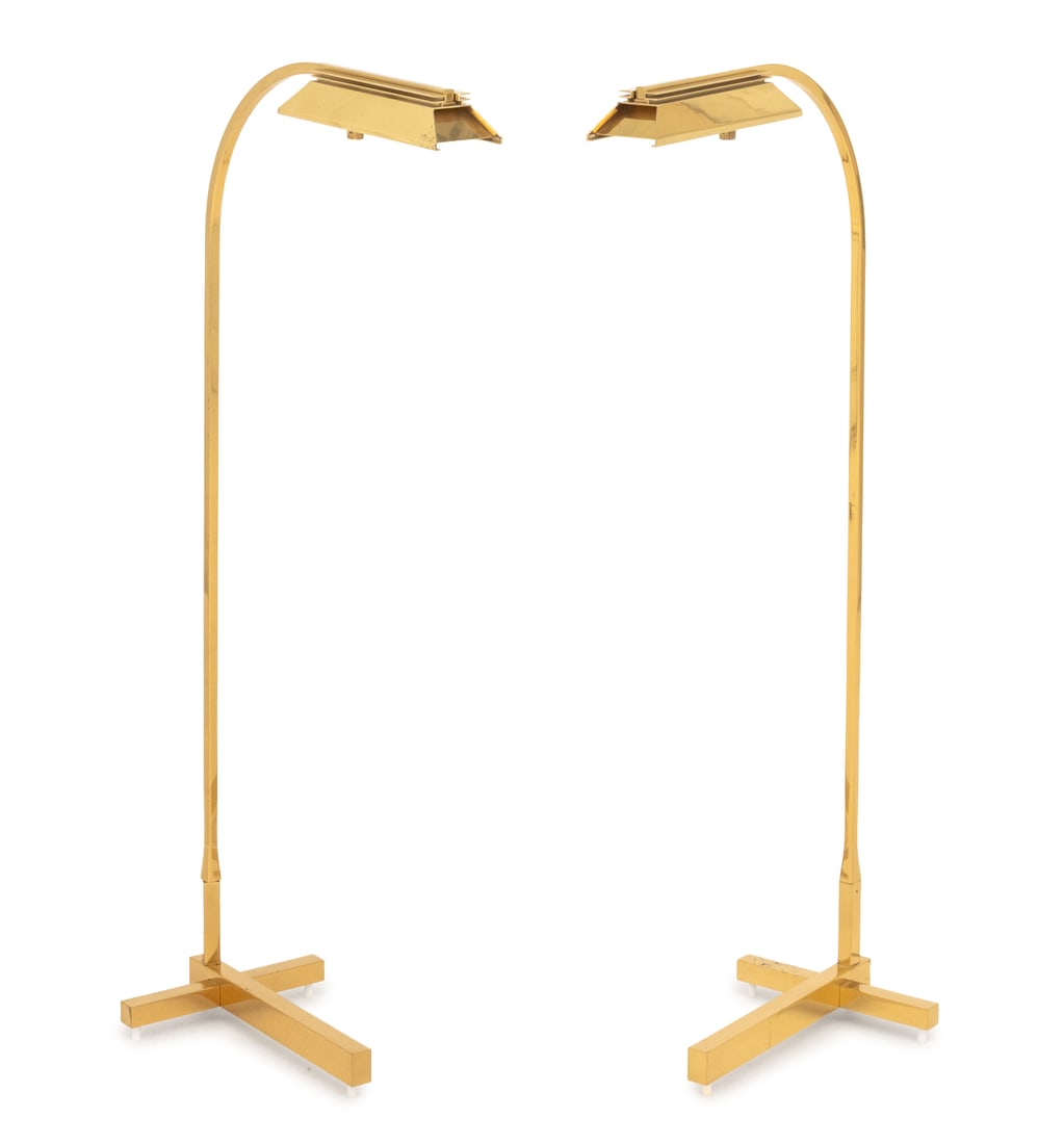 Casella Lighting Adjustable Floor Lamps, Pair: Pair of Casella Lighting Polished Brass Adjustable Floor Lamps, labels to undersides. 43" H x 18" W x 10" D. Provenance: From a 500 Park Avenue Estate. Keywords: Lighting, Designer, American lamps,