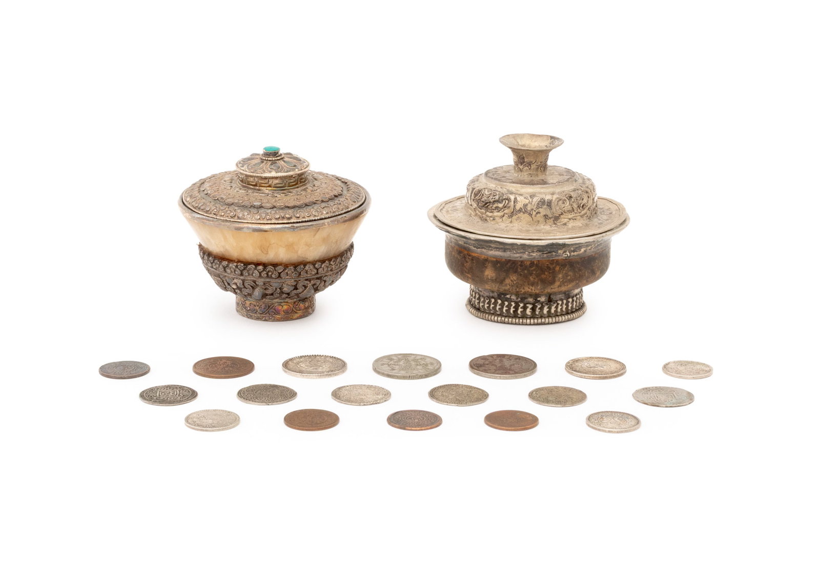 Tibetan Silver and Copper Articles, 20: Collection of 20 Tibetan Silver and Copper Articles, comprising: two covered tea bowls, one silver mounted carved horn with turquoise cabochon and silver mounted walnut with floral incised and repouss