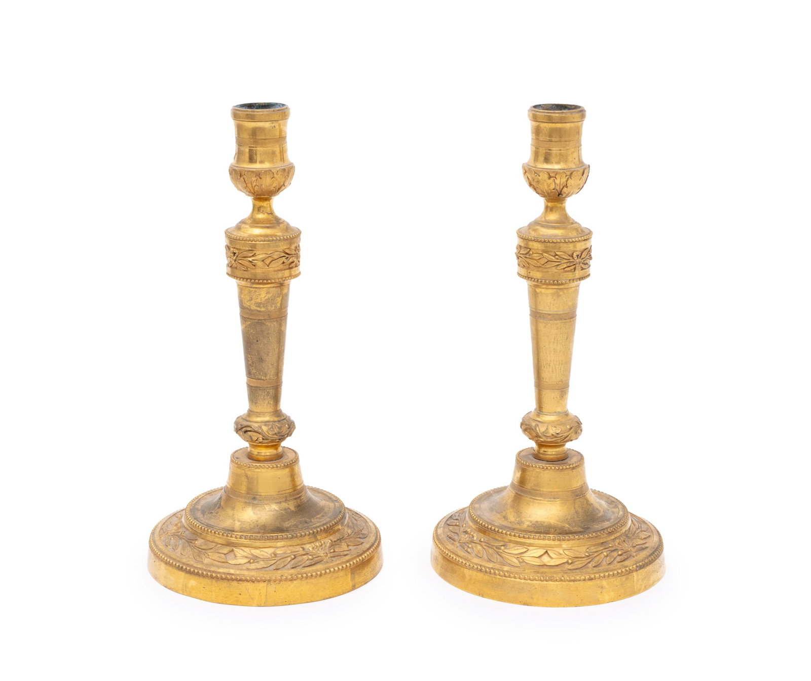 Louis XV Ormolu Candlesticks, 18th C., Pair: Pair of Louis XV Ormolu Candlesticks, 18th century, with laurel leaf motifs. 11.5" H x 5.75" Diameter. Provenance: From a New Mexico Collection. Keywords: Gilt Bronze, French Arts, Lighting, Candlehol