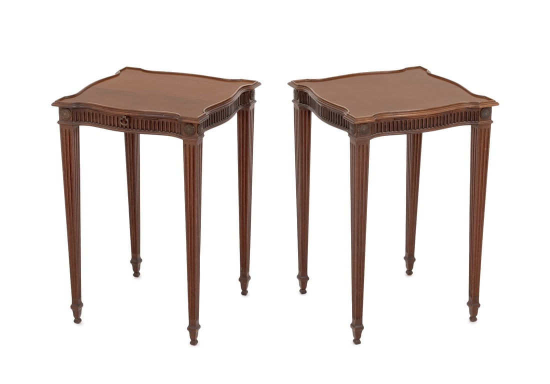 Louis XVI Style Mahogany Side Tables, 2: Near Pair of Louis XVI Style Mahogany Side Tables, with serpentine top with rosettes on four fluted tapered legs. 24" H x 16" W x 16.25" D. Provenance: From an Upper East Side Private Collection. Keyw