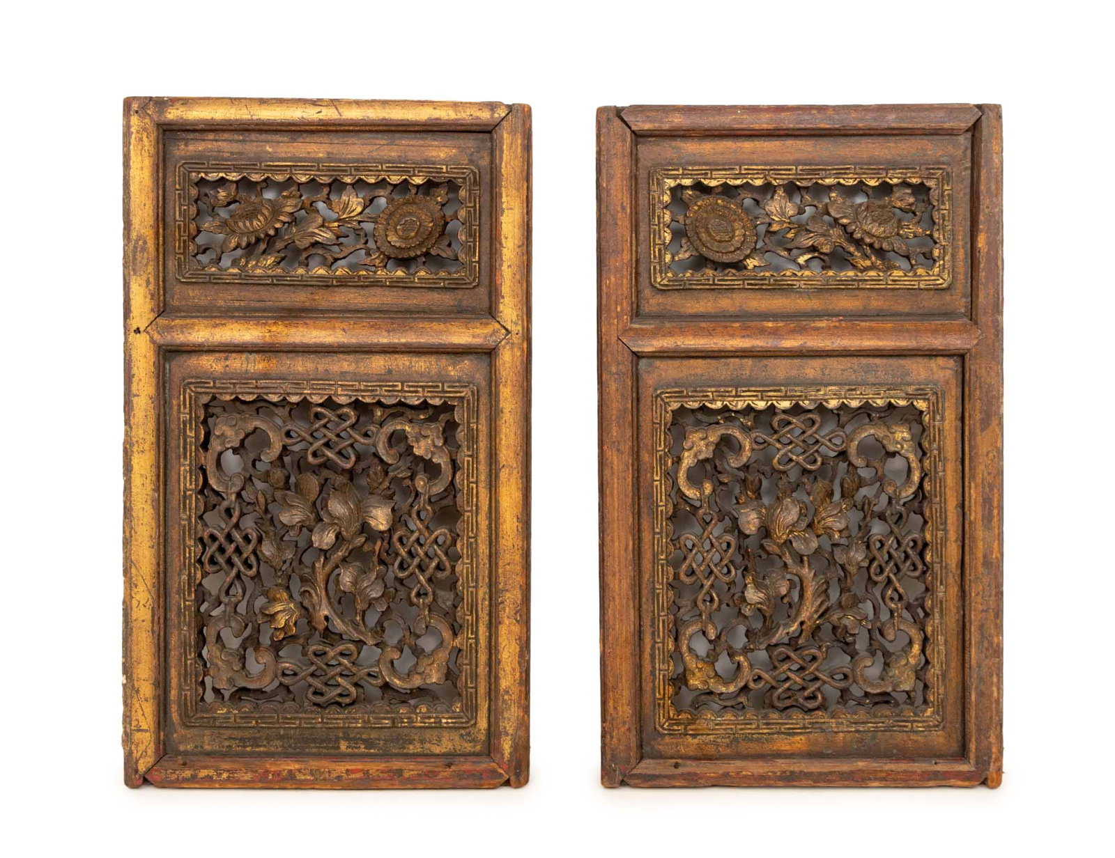 Chinese Red Lacquered and Giltwood Panels, Pair: Pair of Chinese Red Lacquered and Carved Giltwood Panels, each reticulated with infinity knot, floral, and si bat motifs. 21.25" H x 12.75" W x 1.75" D. Provenance: From an East 79th Street Estate.