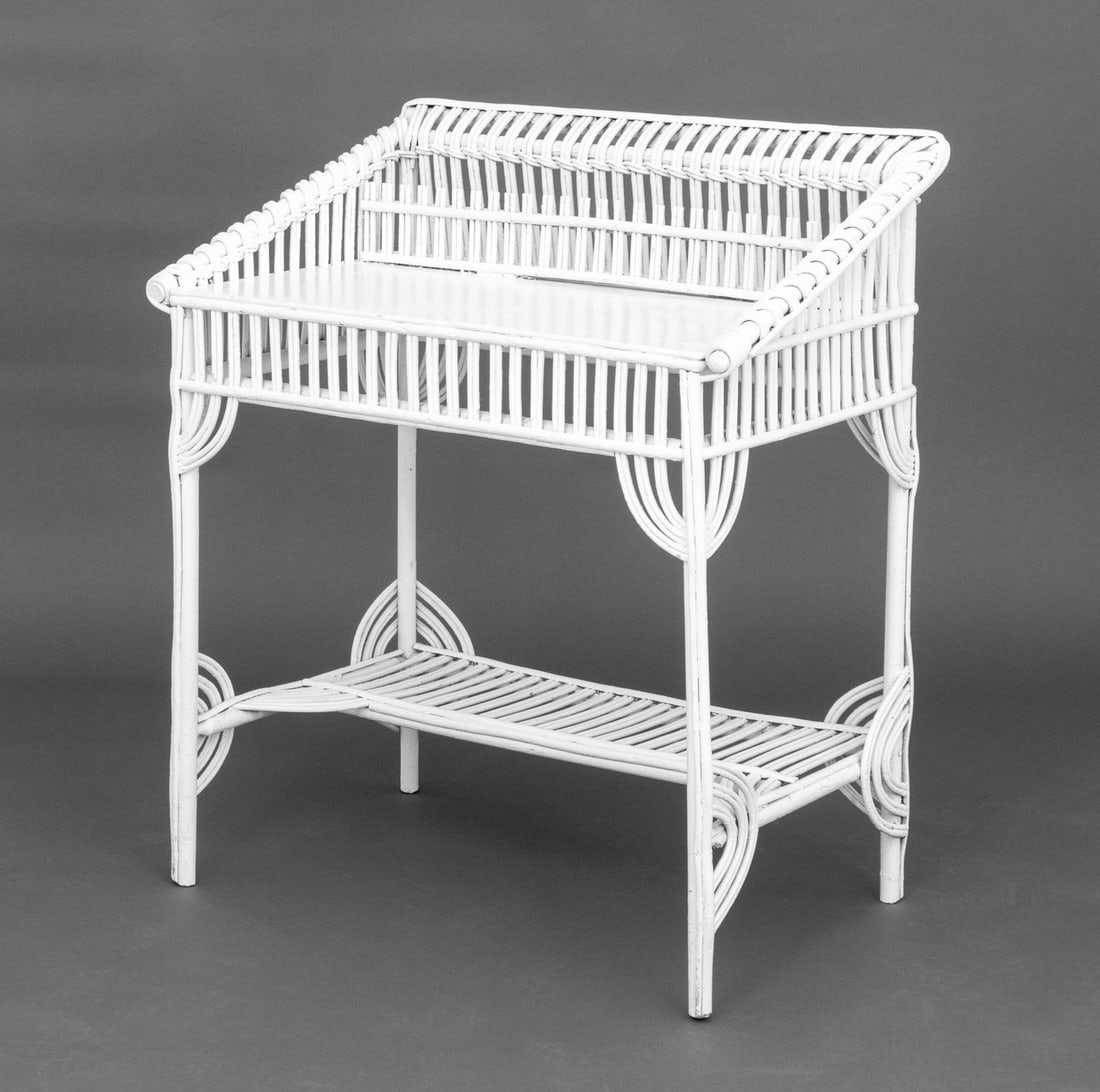 Vintage White Painted Woven Wicker Desk: Vintage White Painted Woven Wicker Desk, with partial galleried writing service above an undertier. 38.5" H x 33.5" W x 22" D. Provenance: From a New York City Collection. Keywords: Vintage